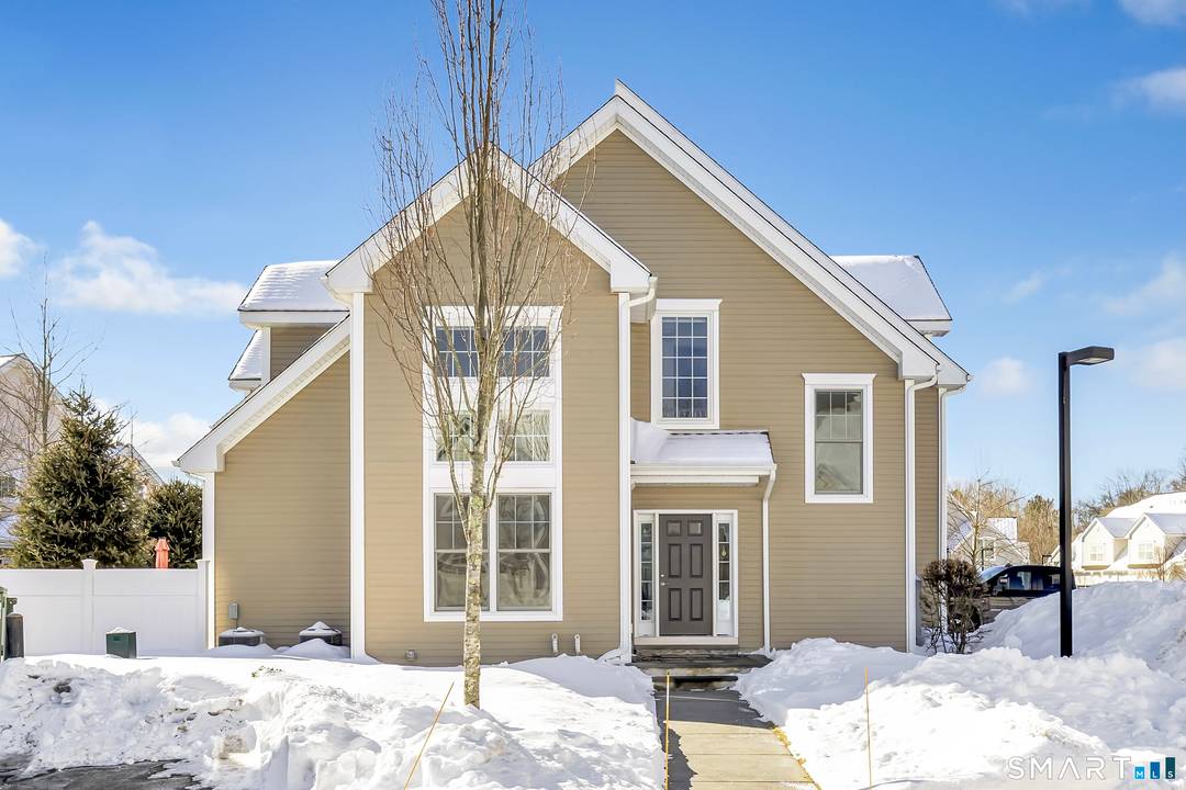 Welcome to 47 Copper Square, Bethel This highly desired duplex end unit offers the perfect blend of luxury, privacy and low maintenance living.