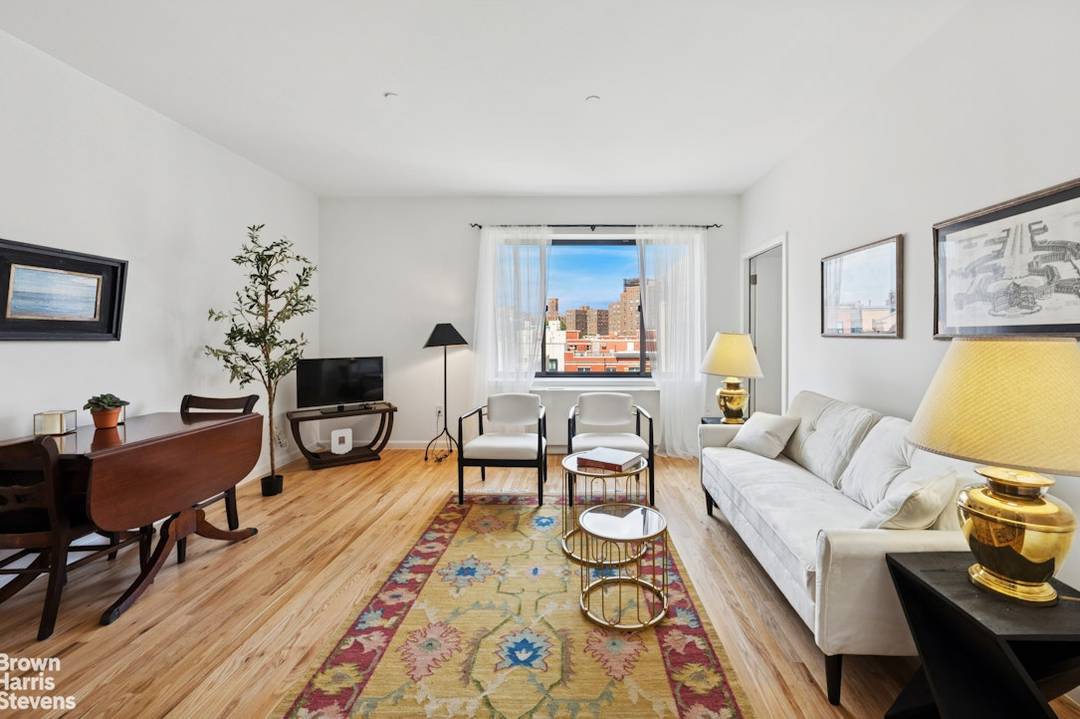 Two bedroom penthouse with a private two story roof deck in a Central Harlem condo.