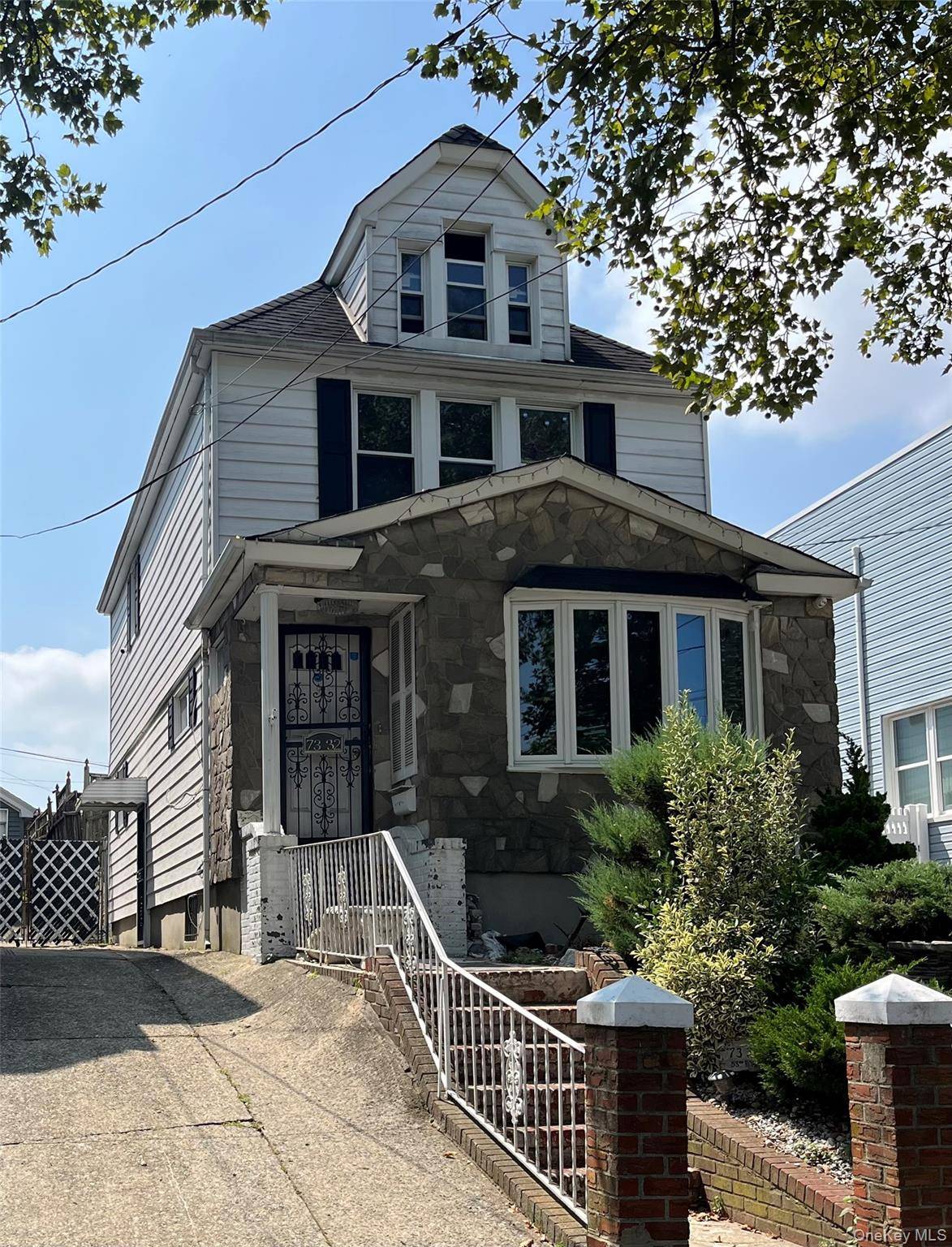 DRIVE BY ONLY No Property Access Great Investment Opportunity in the Heart of Maspeth !