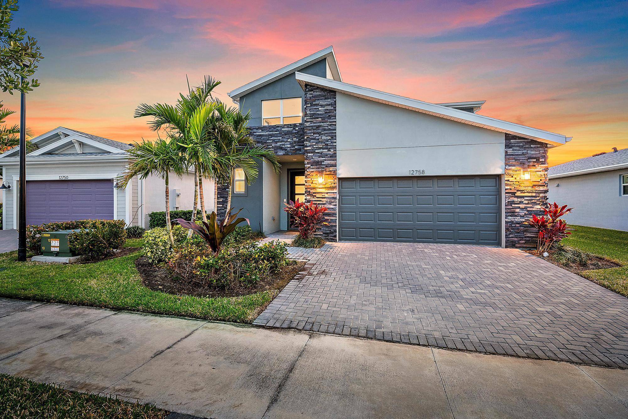 Nearly brand new 2022 built home in the prestigious Emery community on an stunning lakefront lot.
