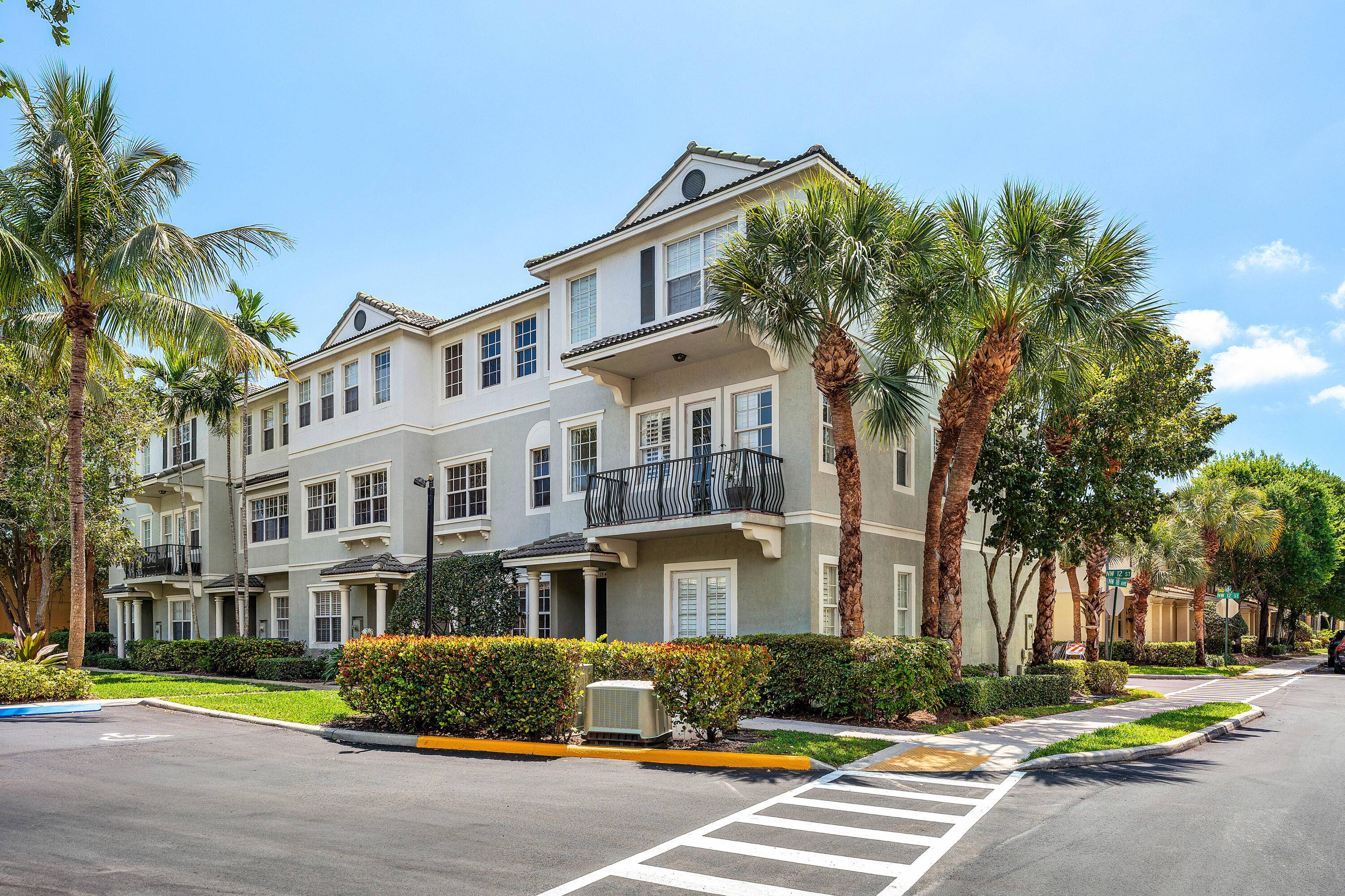 Beautiful 3 story townhome in gated Fairfield Gardens in Central Boca Raton !