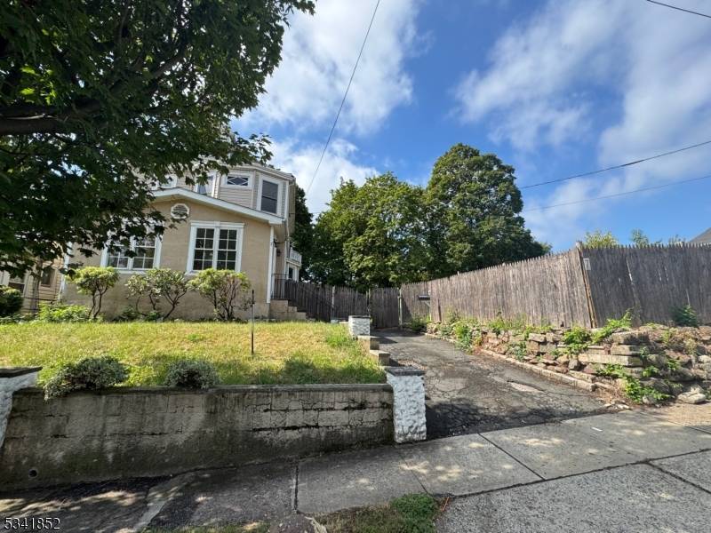 Welcome to this spacious and inviting four bedroom, two bathroom home located in the heart of West Orange, NJ !