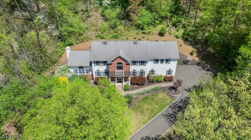 Experience timeless elegance and modern comfort in this exceptional colonial, offering spectacular views, unmatched tranquility, and total privacy all just minutes from top rated schools, shopping, major highways, and public ...