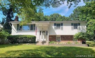 This spacious 5 bedroom, 2 full bath Hi Ranch offers a bright, open living area and a flexible layout perfect for today's lifestyle.