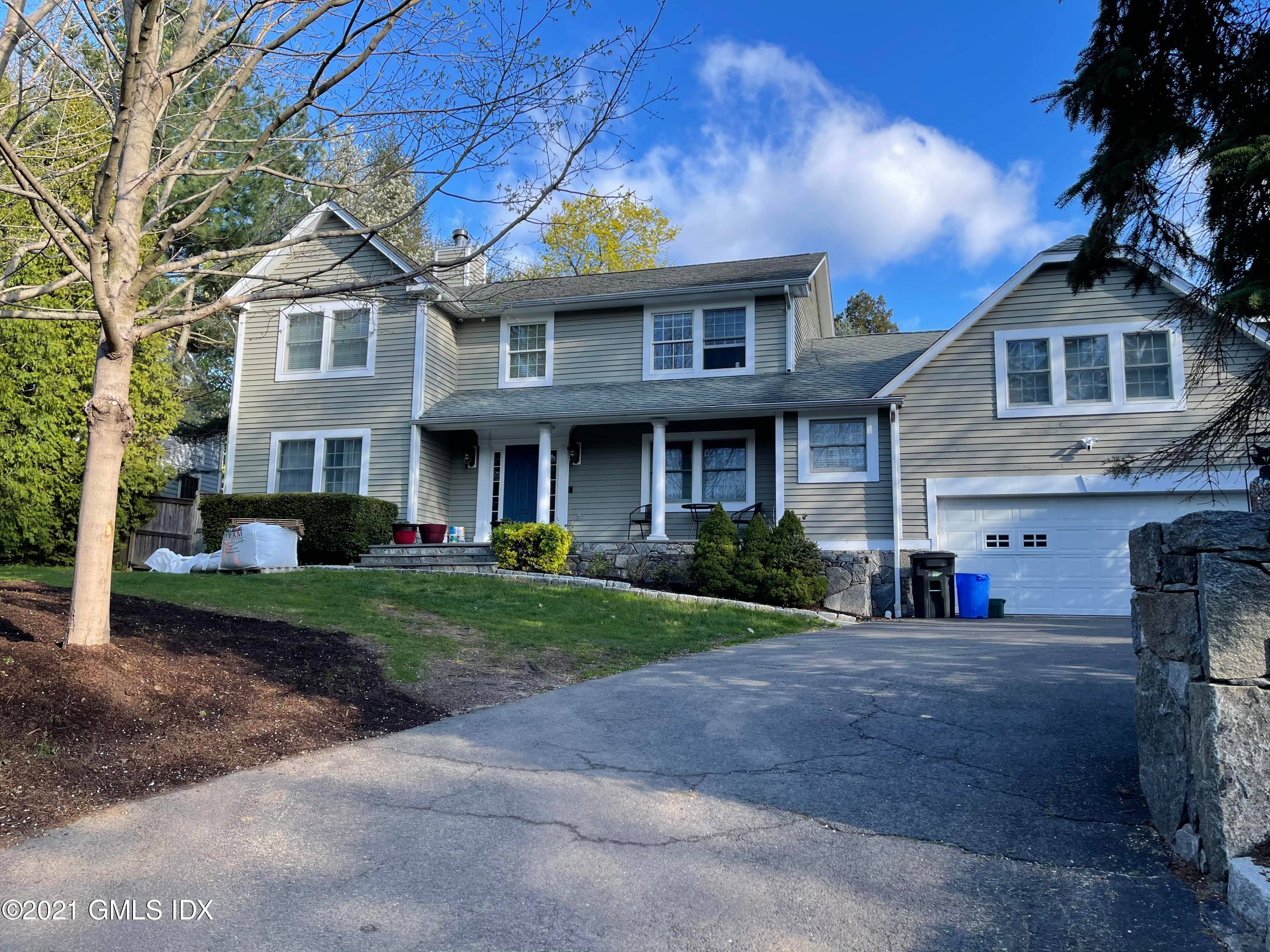 Beautiful Colonial with 4 bedroom, 2 1 2 baths, updated kitchen, large bonus room above the garage.