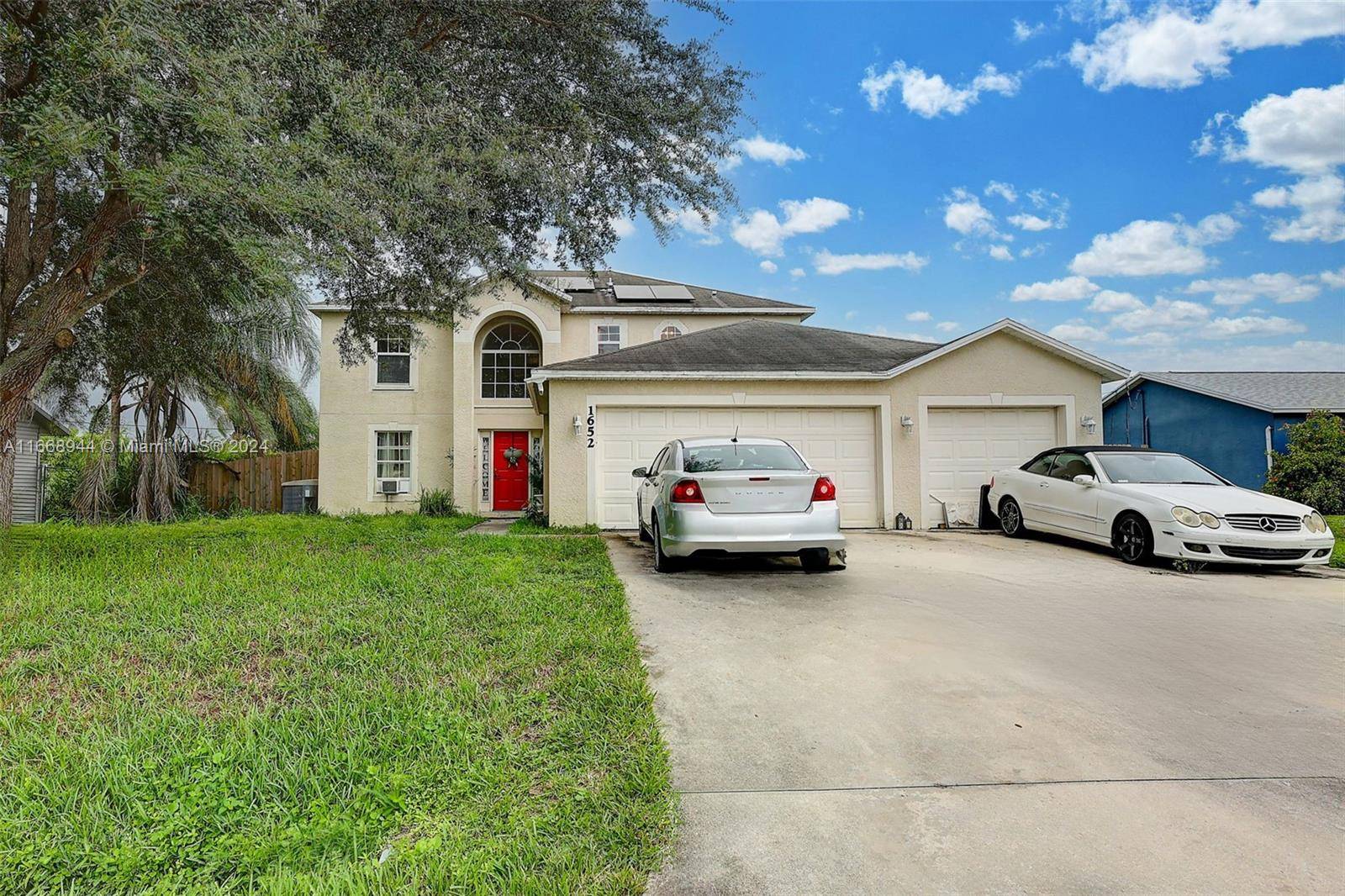 Great Home in sort after Port St Lucie with 4 bedrooms and 2 1 2 bathrooms and 3 car garage, formal living and dining room, updated cabinets and a large ...