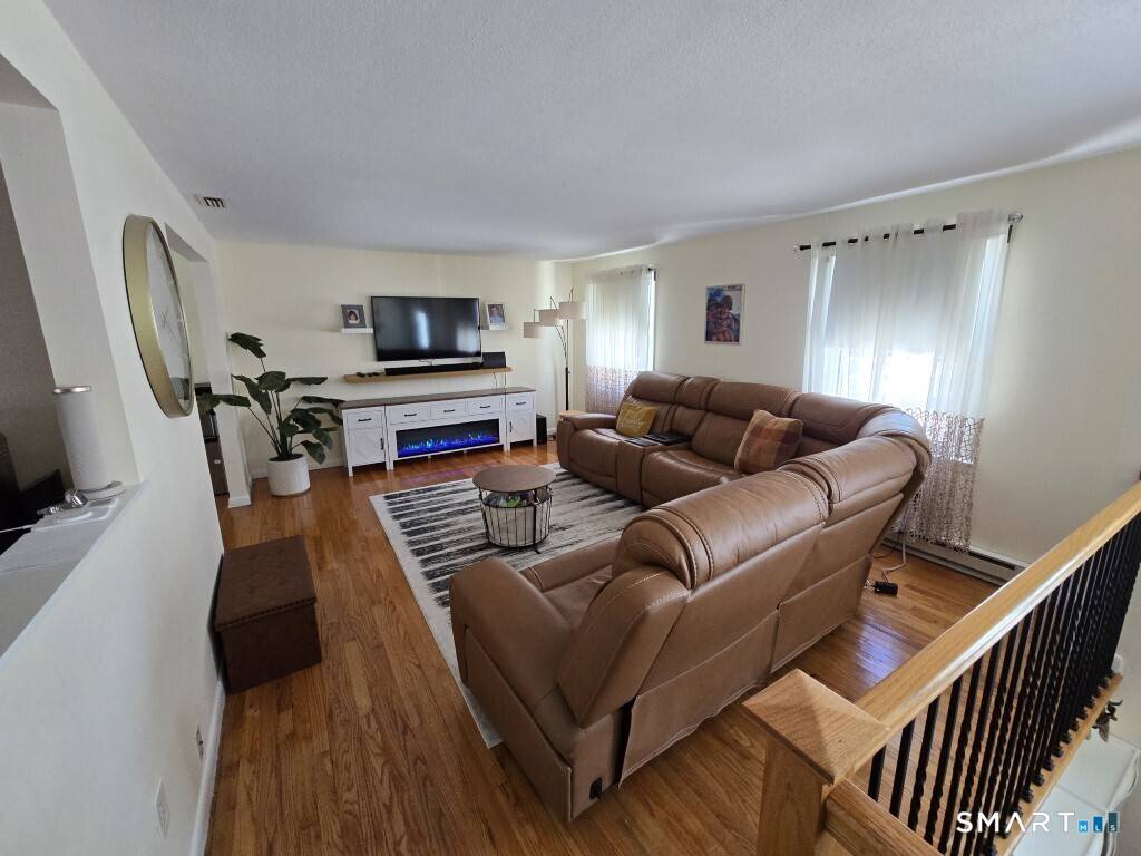 Move right into this nicely maintained Raised Ranch in a desirable neighborhood in Cheshire.