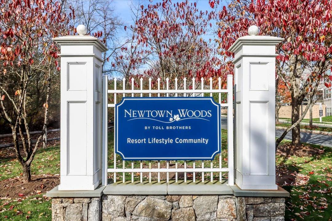 Luxurious one level living awaits in this beautifully appointed Toll Brothers residence at Newtown Woods, a sought after 55 community.