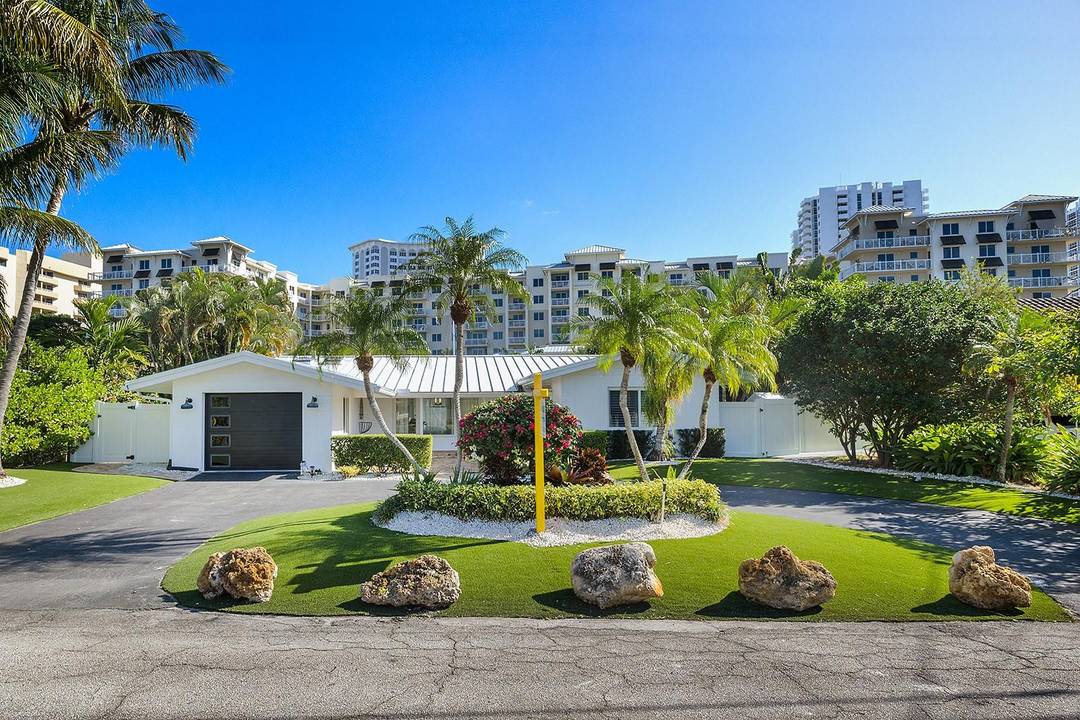 An impeccably renovated 3 bed, 3 bath Old Florida style estate reimagined with sophisticated modern luxury.