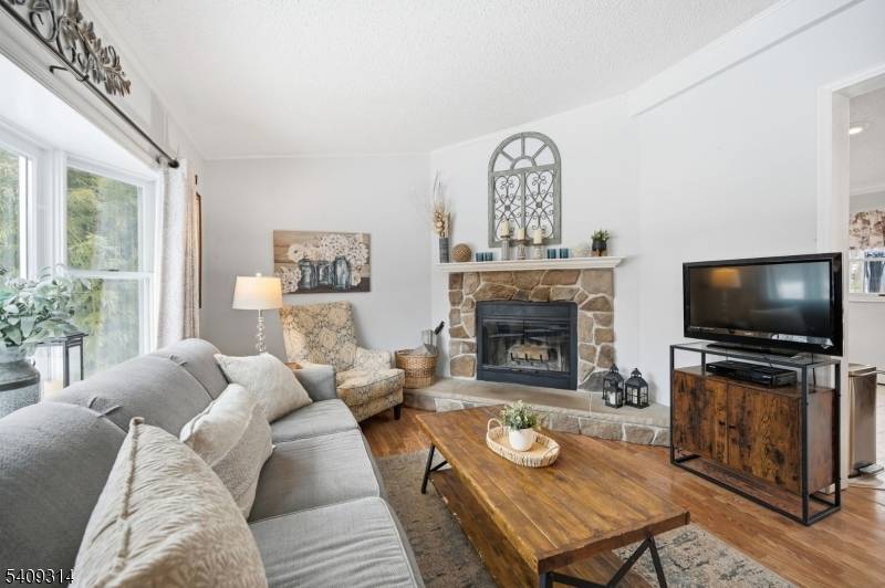 Raised Ranch Located in Desirable Olde Milford Estates.