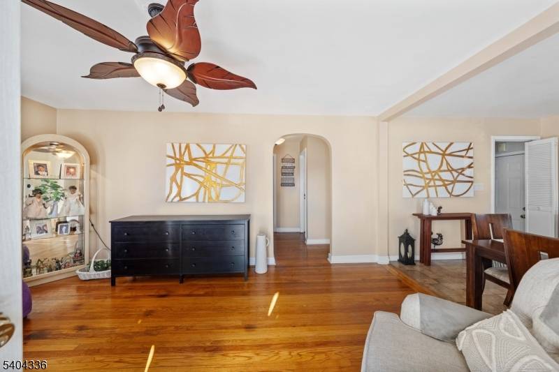 Welcome to this beautifully maintained Cape Cod style home located on a quiet street in Linden's desirable Sunnyside section.