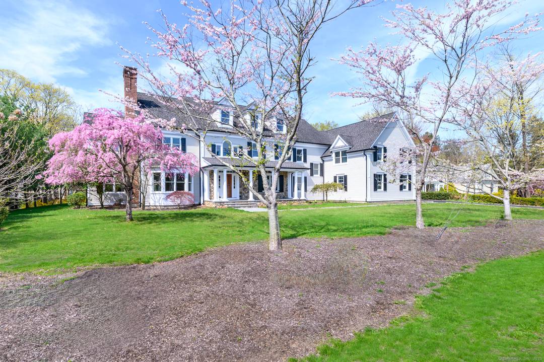 Stately North Stamford Colonial w Sweeping Curved Staircase.