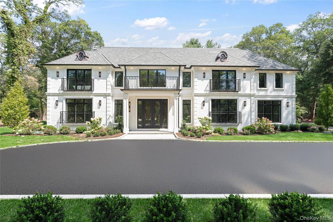 Brookville New Construction Welcome home to 12 Quaker Ridge Drive a pristine brick, center hall colonial set on 2 acres at the end of a quiet cul de sac.