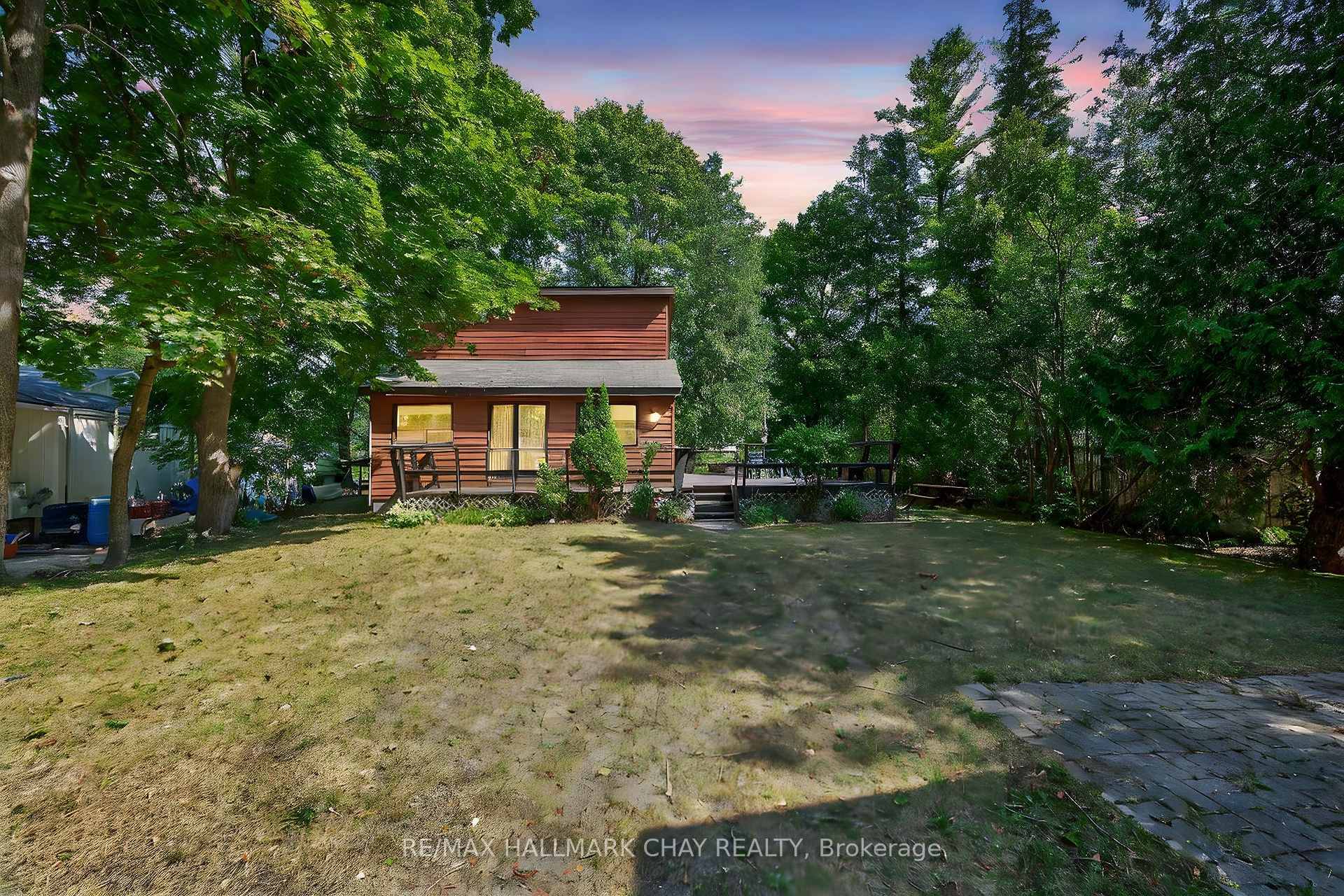 Welcome to 566 Oxbow Park Drive a charming all season, fully winterized cottage or home, perfectly situated on the serene Nottawasaga River.