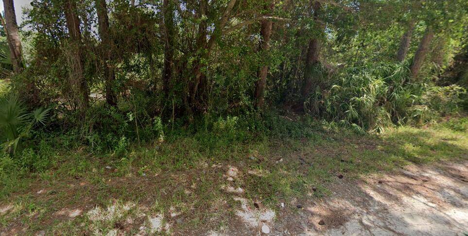 Great opportunity to build your dream home on a beautiful lot in quaint neighborhood of Vero Beach !