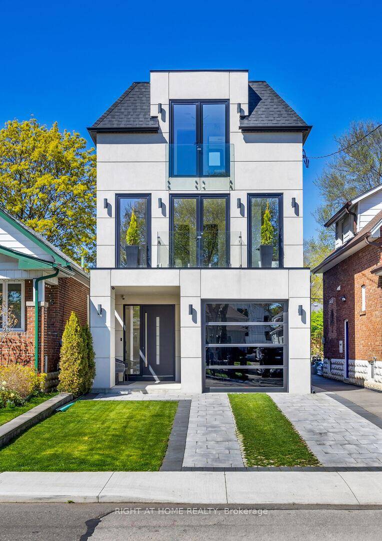 Own An Un replicable Custom Home Steps Away From Lake Ontario in West Toronto.