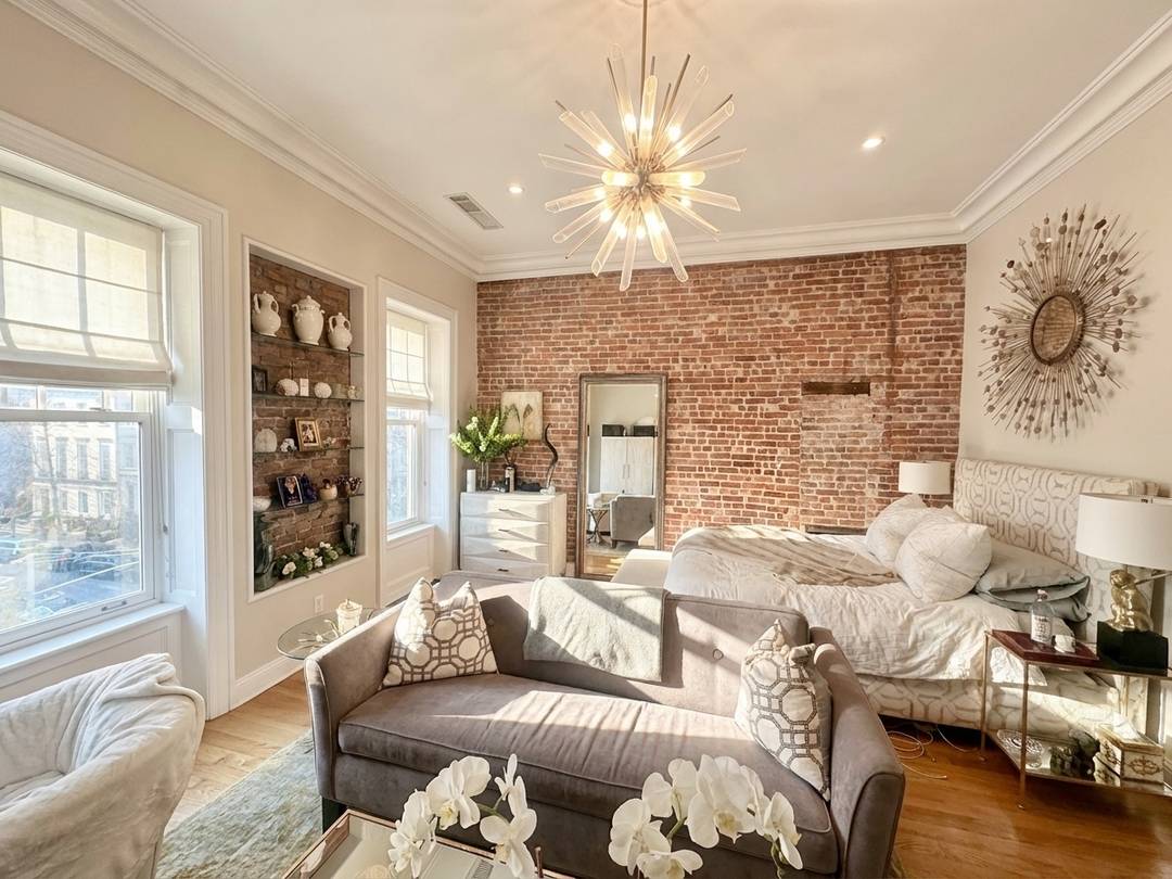 Bright, Renovated Studio with Exposed Brick in Prime Upper East Side Location Welcome home to this sun filled, thoughtfully laid out studio on iconic Madison Avenue.
