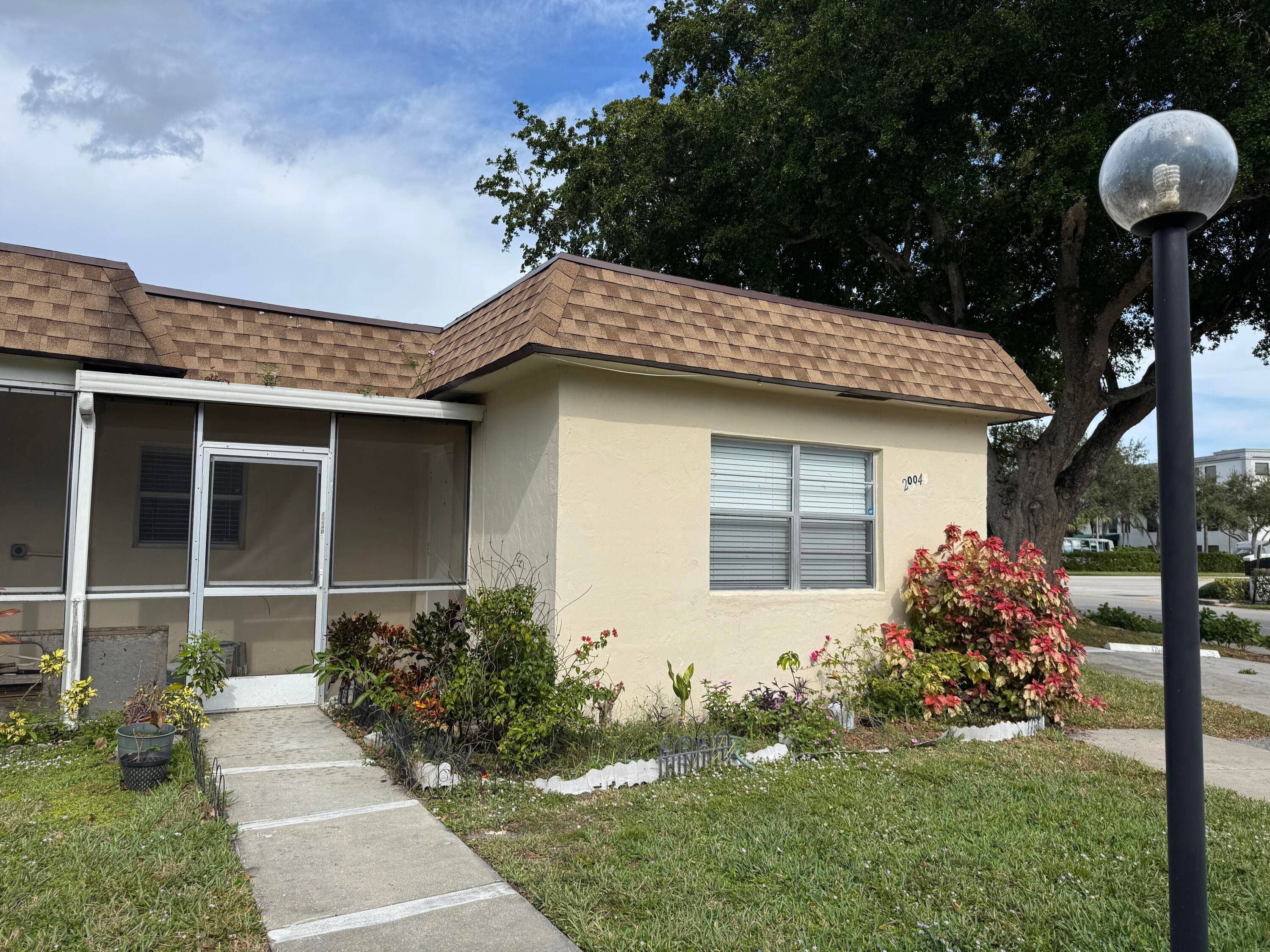 Welcome to this charming 2 bedroom, 2 bathroom villa located in peaceful 55 community of Natura in Deerfield Beach.