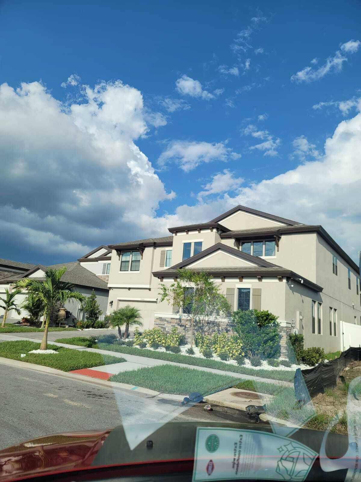 The Belmar impresses with its two story volume ceiling in the foyer, which opens to the den, dining room and the split garage entrances.