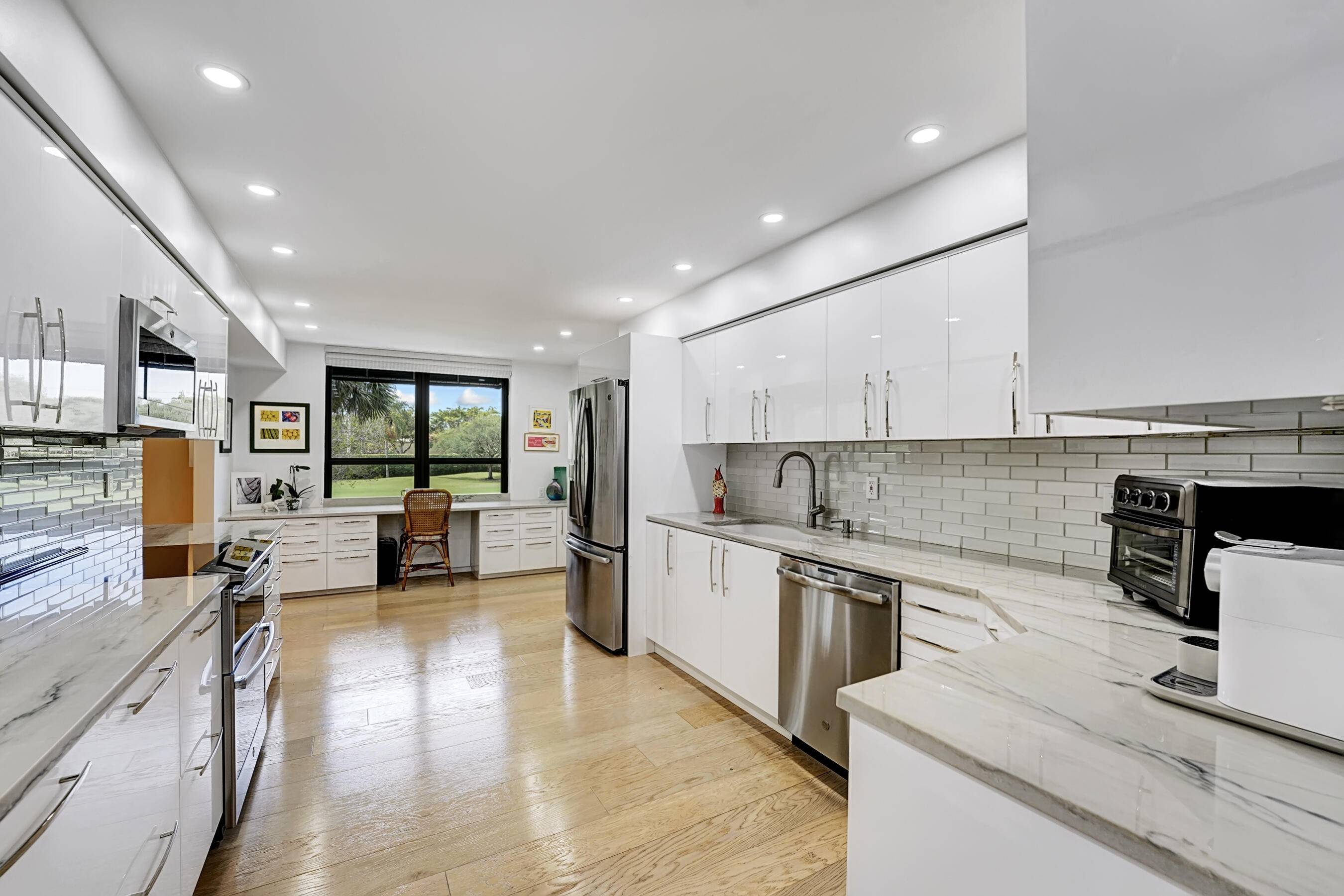 Don't miss the opportunity to own this stunning, move in ready corner condo that lives like a private home.