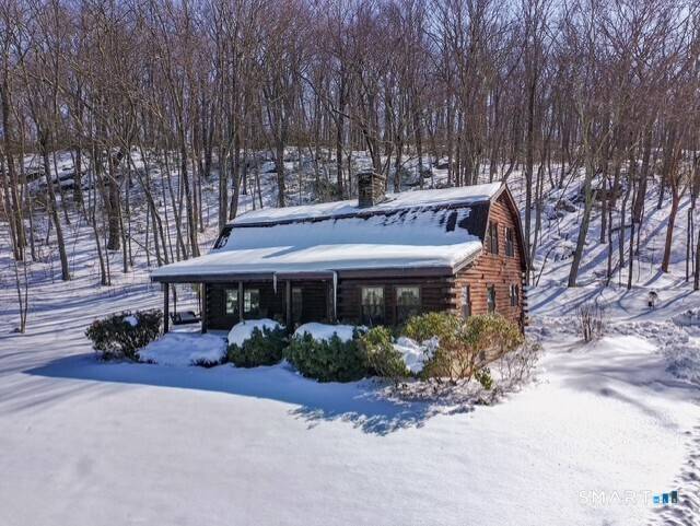 Tucked deep into 2. 2 peaceful acres, this 2, 000 sq ft log cabin feels like your own private woodland retreat.