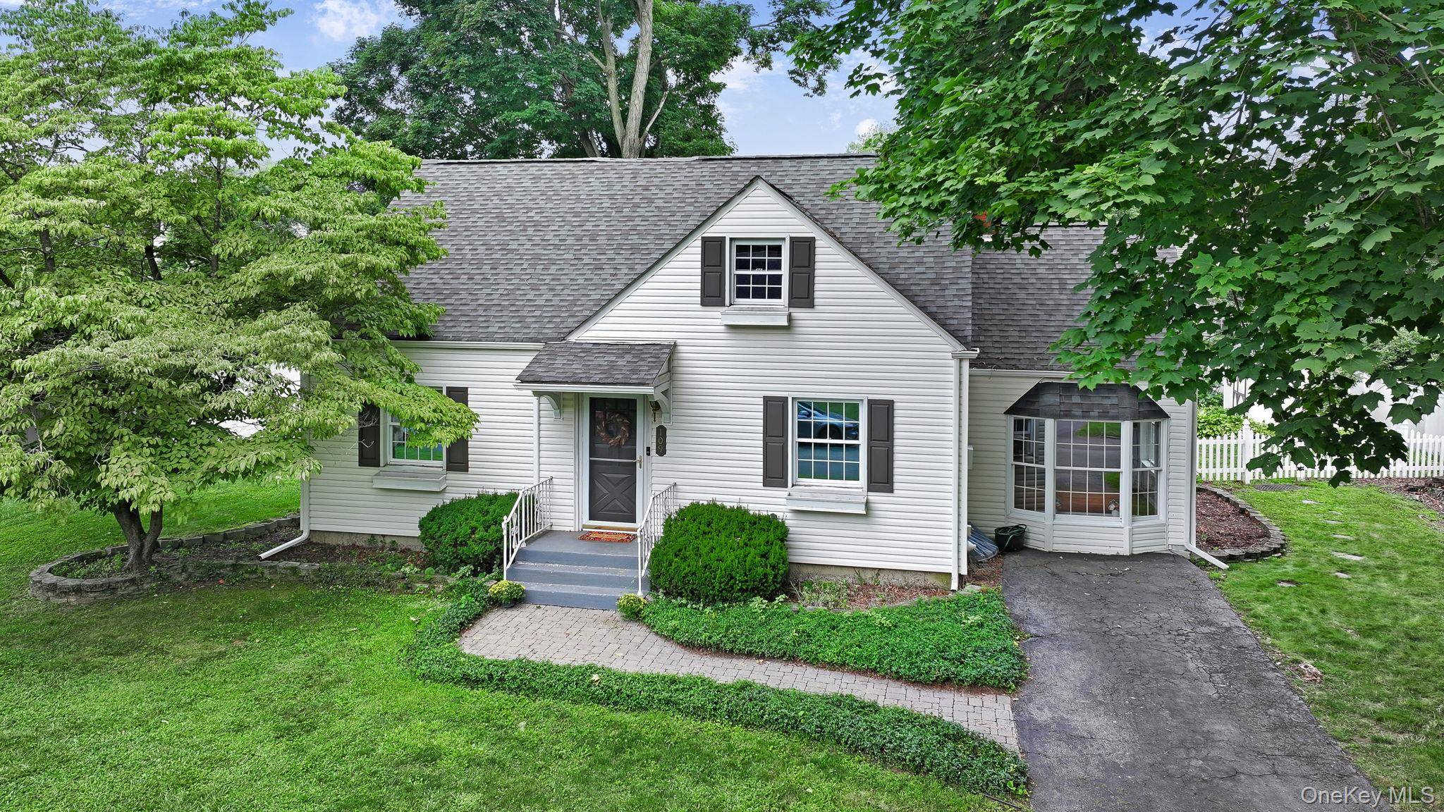 Nestled in the iconic Lacey Field neighborhood in the Town of New Windsor, is this 1940's Cape Cod blending original character with thoughtful updates.