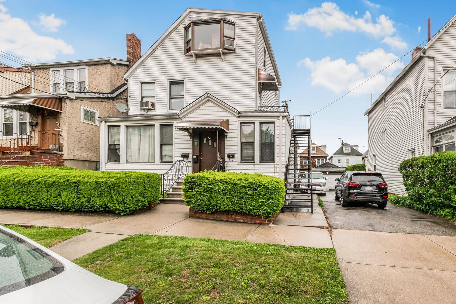 Wonderful opportunity to own a Legal 2 Family Home tucked away in the heart of McLean Heights boasting a long driveway and a detached Garage.