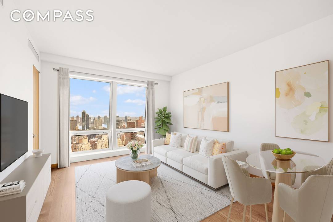Perched high on the 37th floor, this luminous 1, 168 square foot 2 bedroom, 2.
