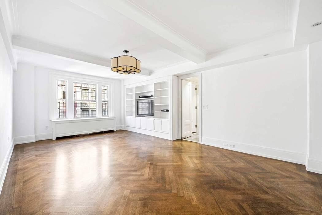 9B is a gracious and perfectly proportioned corner Classic 7 in one of the Upper East Side's only Rosario Candela Condominiums.