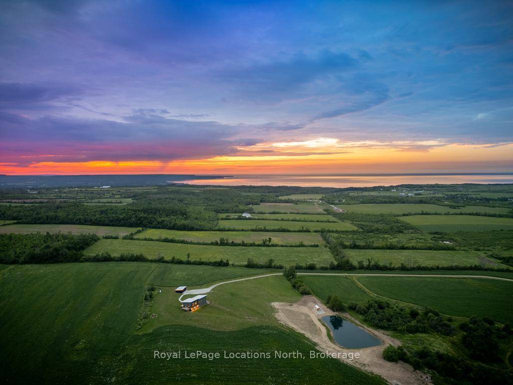Welcome to your private dream retreat, nestled between Thornbury and Meaford on 94 acres of rolling countryside.