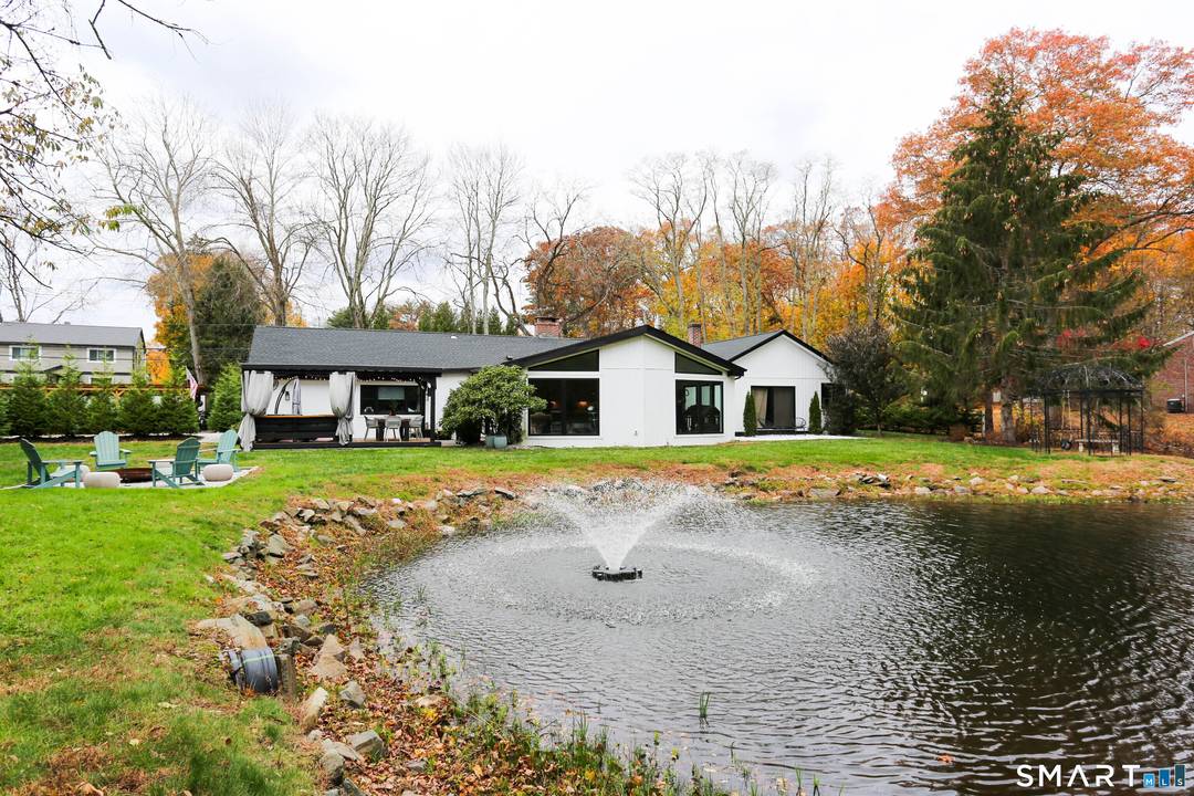 Ideally located in the heart of Westport and close to all schools, this exceptional Contemporary Ranch has been thoughtfully renovated, offering one level living with effortless sophistication.