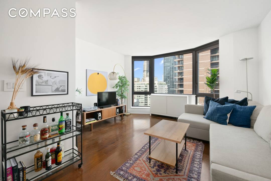 Welcome to Residence 21B A Sophisticated Upper East Side Haven with Iconic Skyline Views This bright and elegant one bedroom, one bathroom home offers an exceptional living experience high above ...