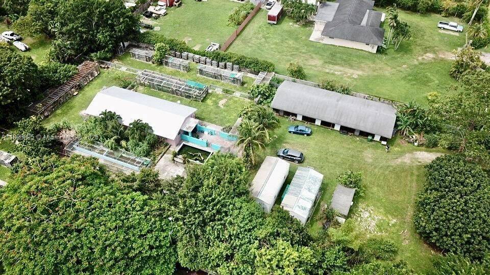 745 This expansive property, situated on 1 acre, is a one of a kind opportunity.