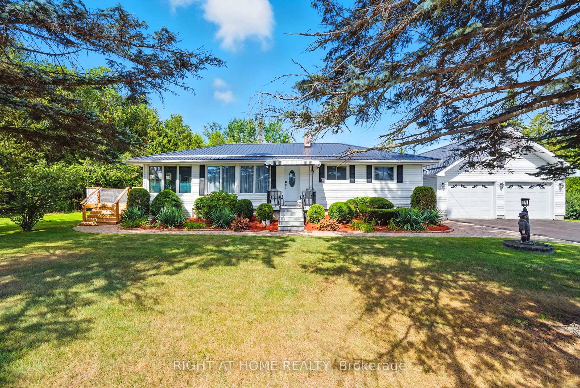 Discover the perfect blend of comfort and country charm in this impeccably maintained home, nestled on 1.