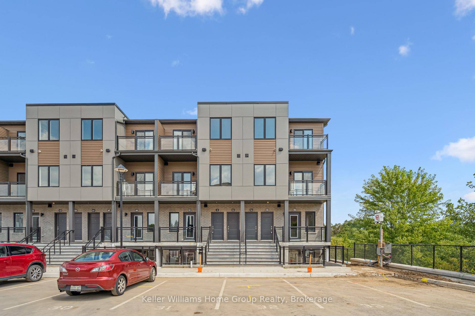Modern 2 Bedroom, 2 Bath Stacked Townhouse for Lease 1050sq ft with two balconies.