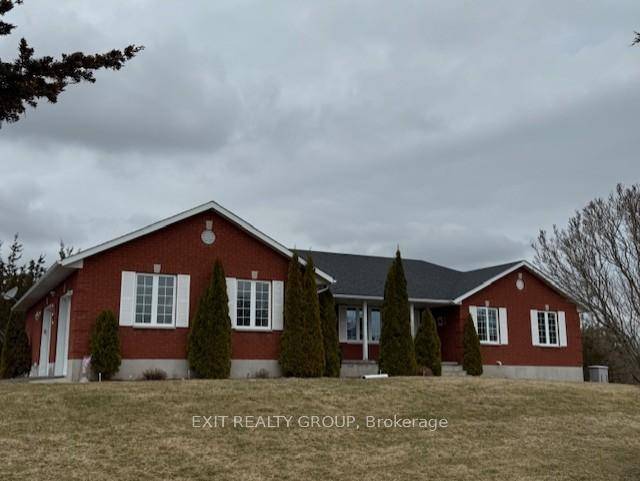 A beautiful, spacious home nestled into almost 90 acres just north of Belleville.