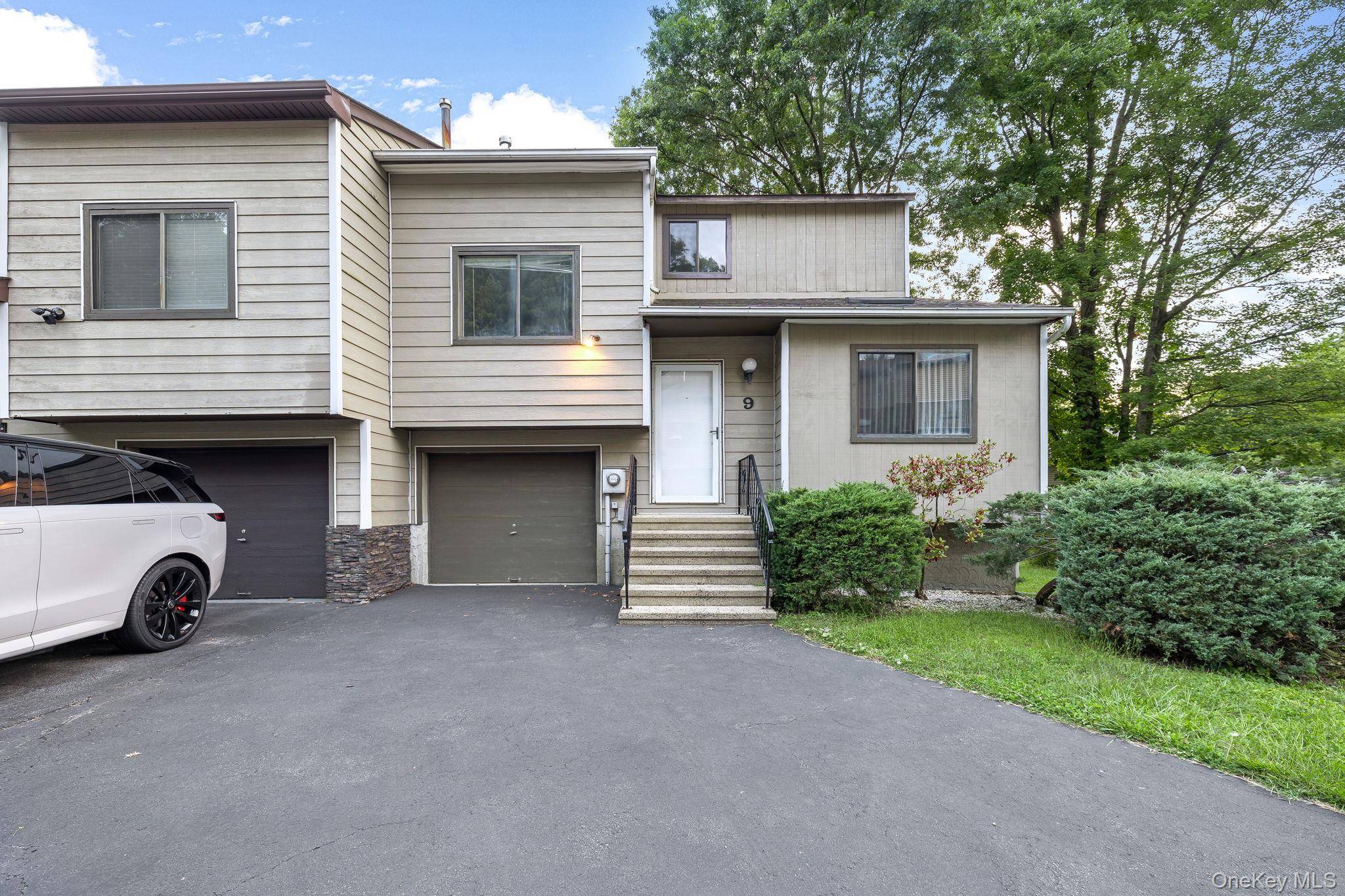 Welcome to this 3 bed 2 bath end unit townhome located in the sought after Round Hill development of Fishkill.