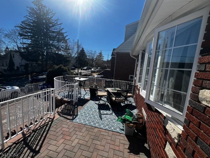 Exceptional and beautifully maintained two family residence offering space, style, and modern upgrades throughout.