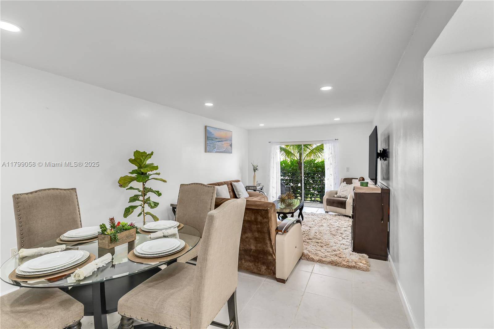 Discover a rare gem in South Beach beautifully updated ground floor condo with two private balconies, in unit washer dryer, and gated parking.