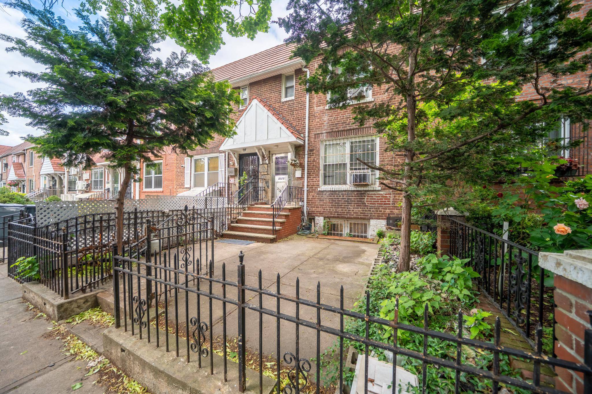 Welcome to this charming brick Tudor style home offering 1, 728 square feet of interior living space in the heart of East Elmhurst.