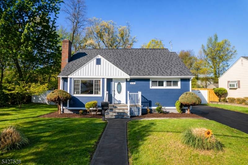 Welcome to this beautifully maintained Cape Cod in one of Plainfield's most desirable and quiet neighborhoods !