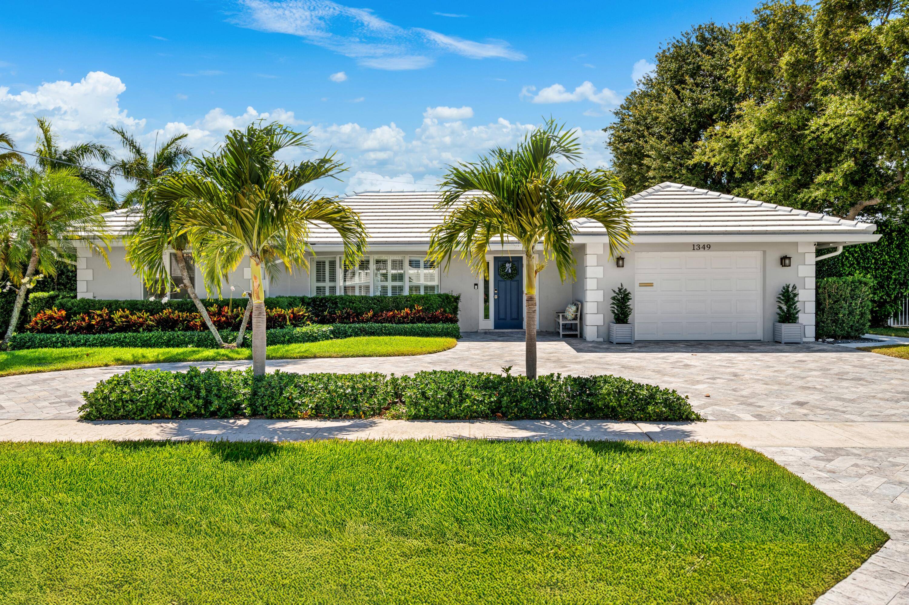 Classic Modern Luxury Redefined on Sugar Plum Drive in Sought After Camino Gardens, East Boca Raton.