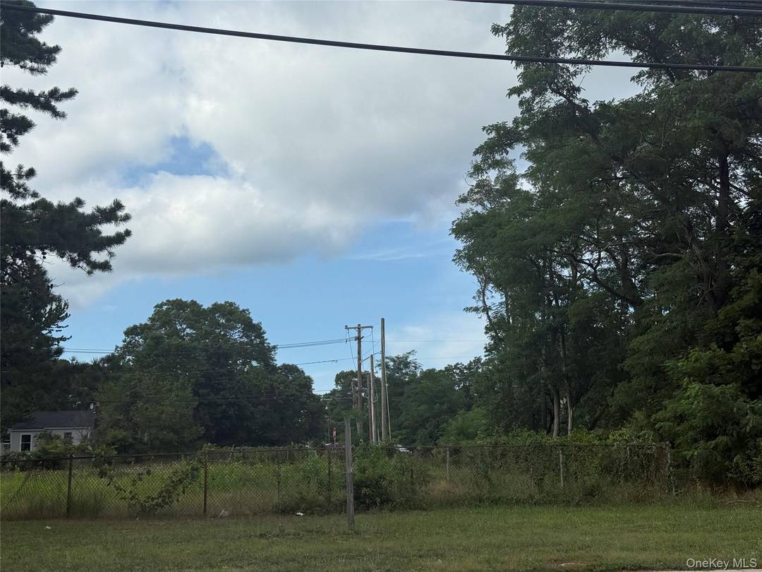 Located just steps from a popular shopping center and surrounded by dense residential neighborhoods, this parcel serves a stable and growing local population.