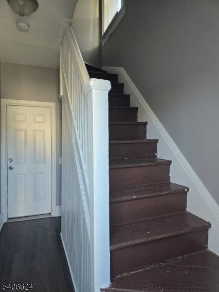 Newly renovated 5 bedroom 2 family nestled on a corner lot with huge 3 car garage.