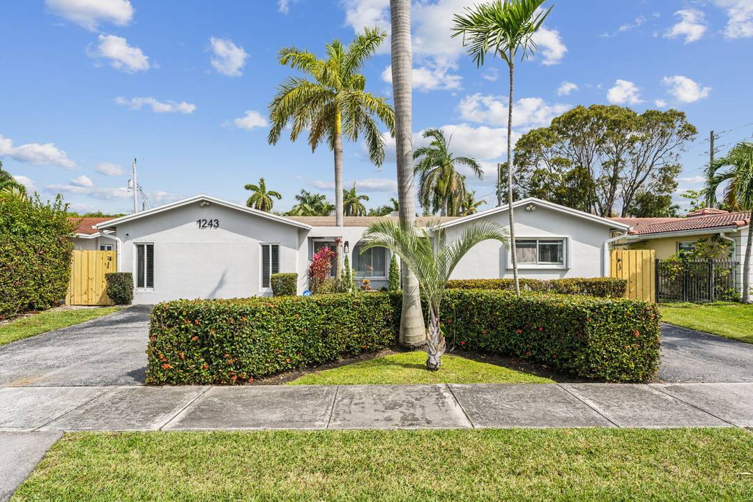 Welcome to 1243 Garfield Street, Hollywood, FL a spacious 4 bedroom, 2.