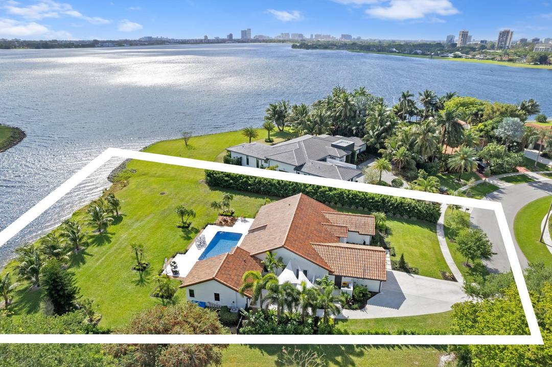 Beautifully updated direct lakefront home in Presidential Estates.