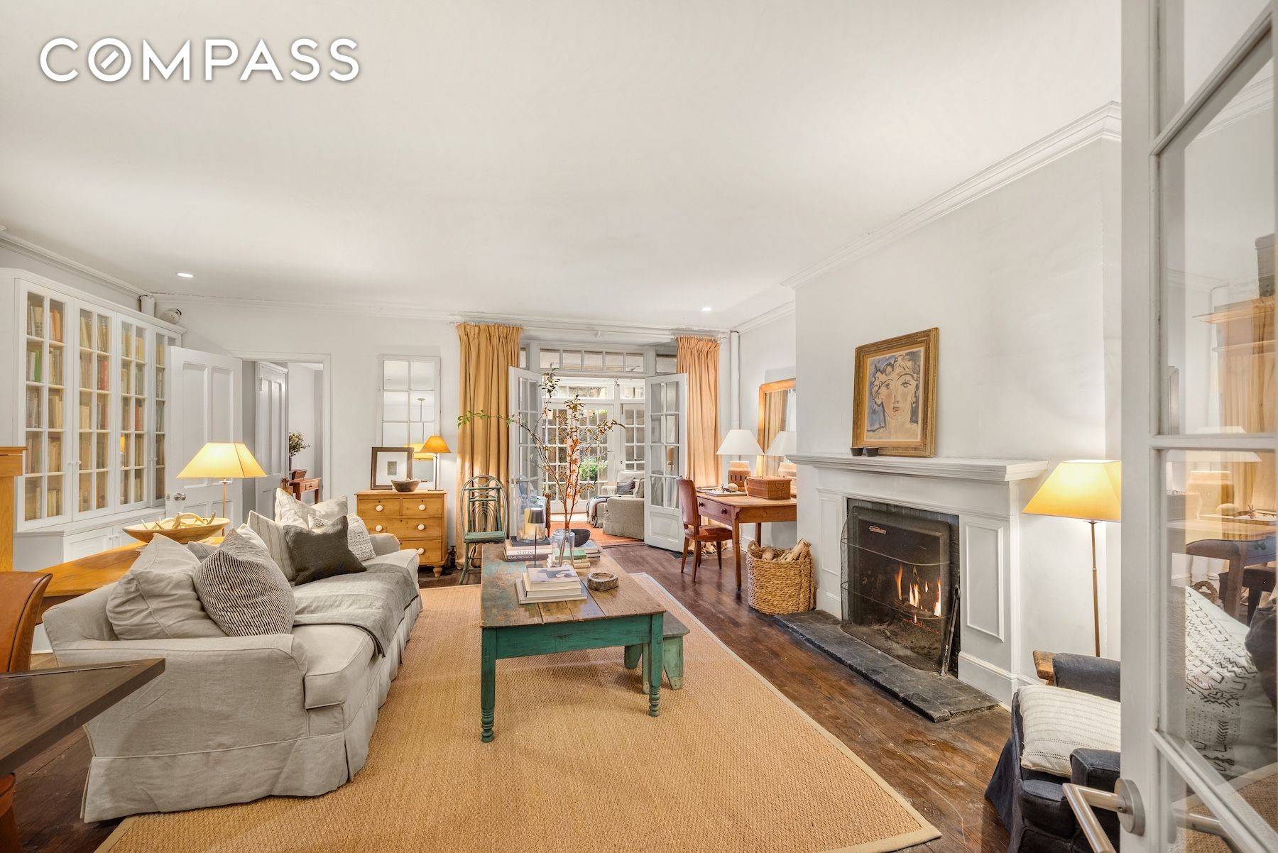 Prepare to fall in love with this charming two bedroom in an 1883 town house coop with two working wood burning fire place, a private outdoor space and a sunroom ...