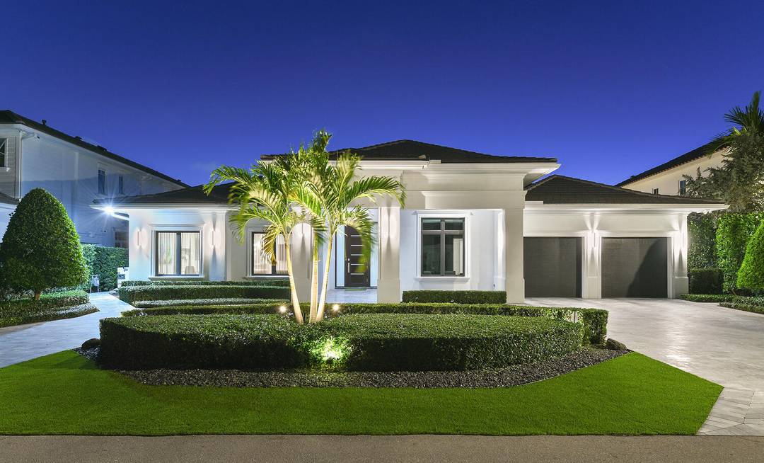 Sought after Royal Palm Yacht and Country Club elegant contemporary modern single story home.