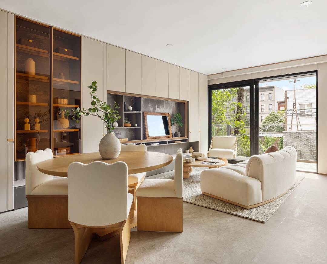 Tucked at the intersection of Williamsburg and Greenpoint, The Samuel Greenpoint is a collection of four design forward homes built for a lifestyle that moves seamlessly between private retreat and ...