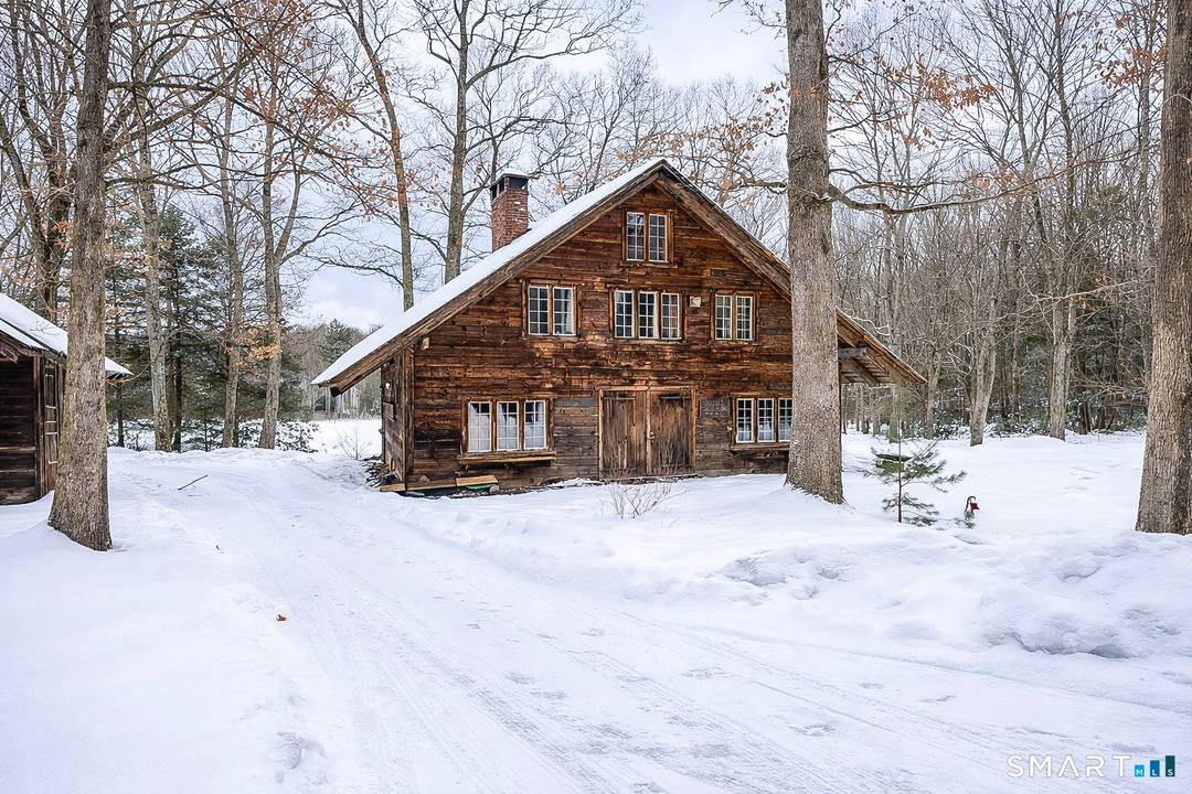 PRIVATE TIMBER FRAME RETREAT ON 32 ACRES NEW HARTFORD Rare rental opportunity on 32 secluded acres with private pond access in New Hartford.